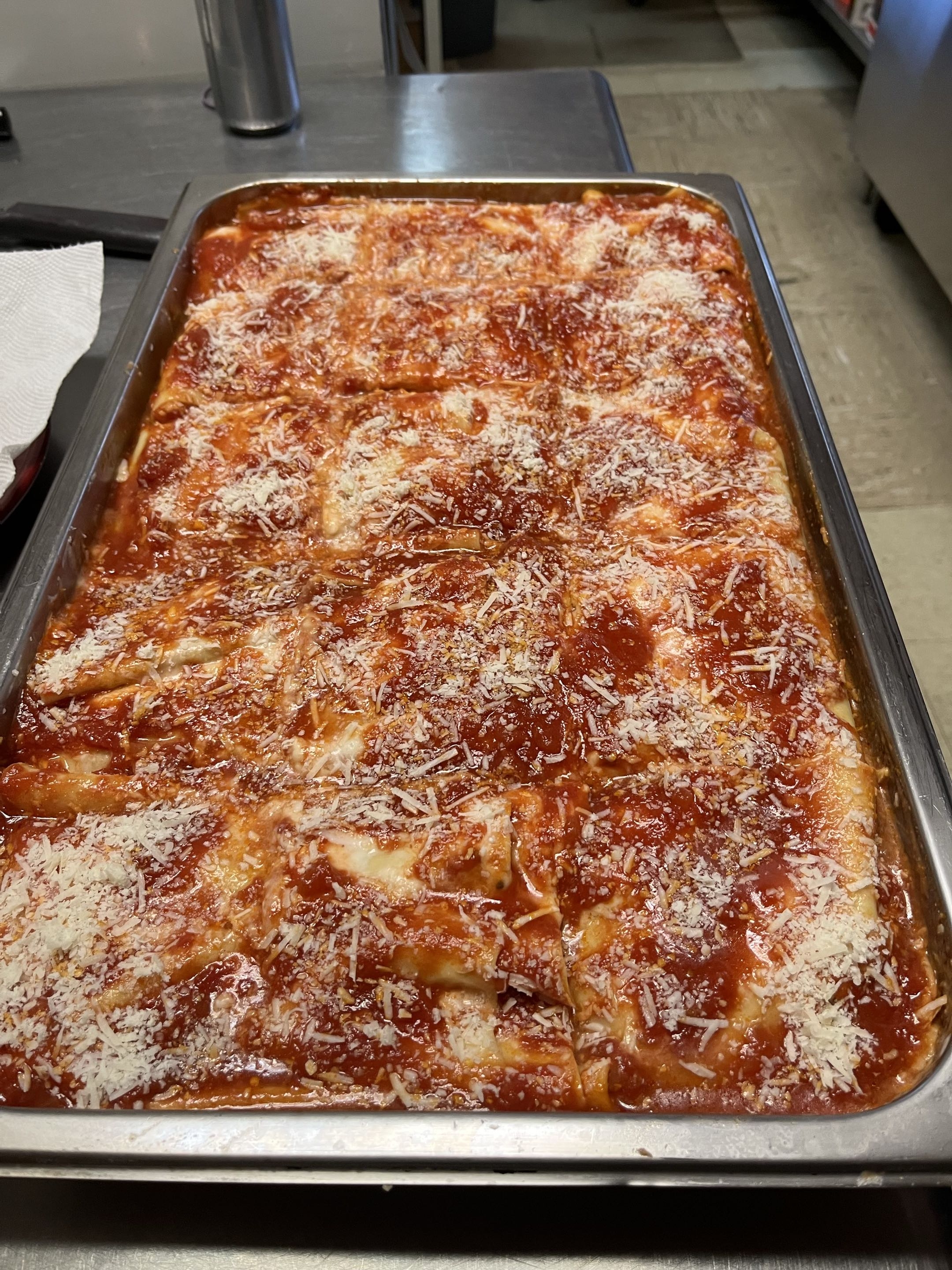 Nonna's homemade lasagna ready to serve